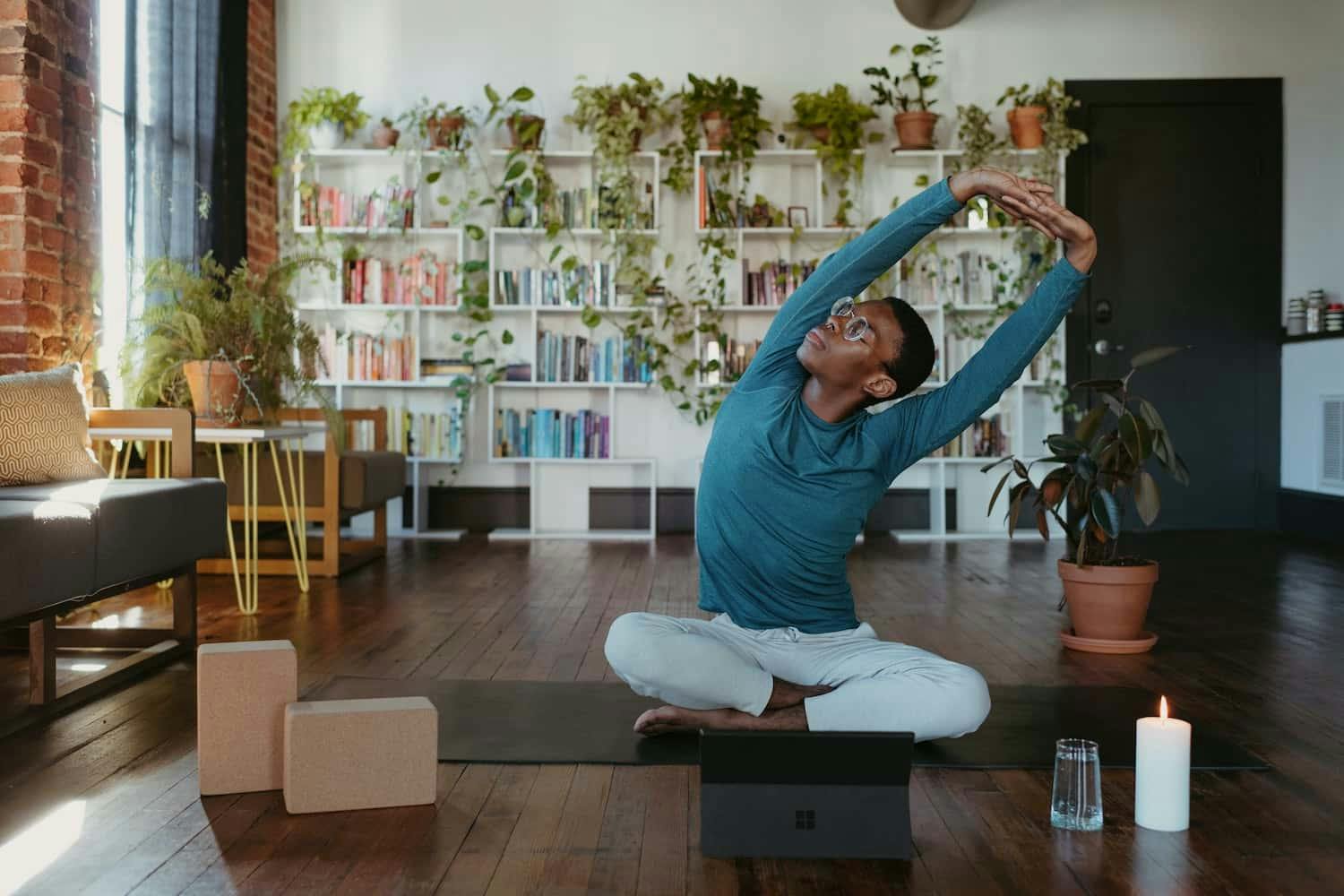 Image shows person doing yoga stretches
