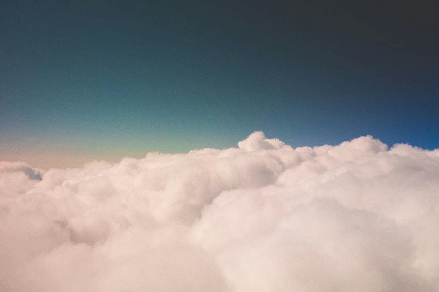 Image shows sky above the clouds. 