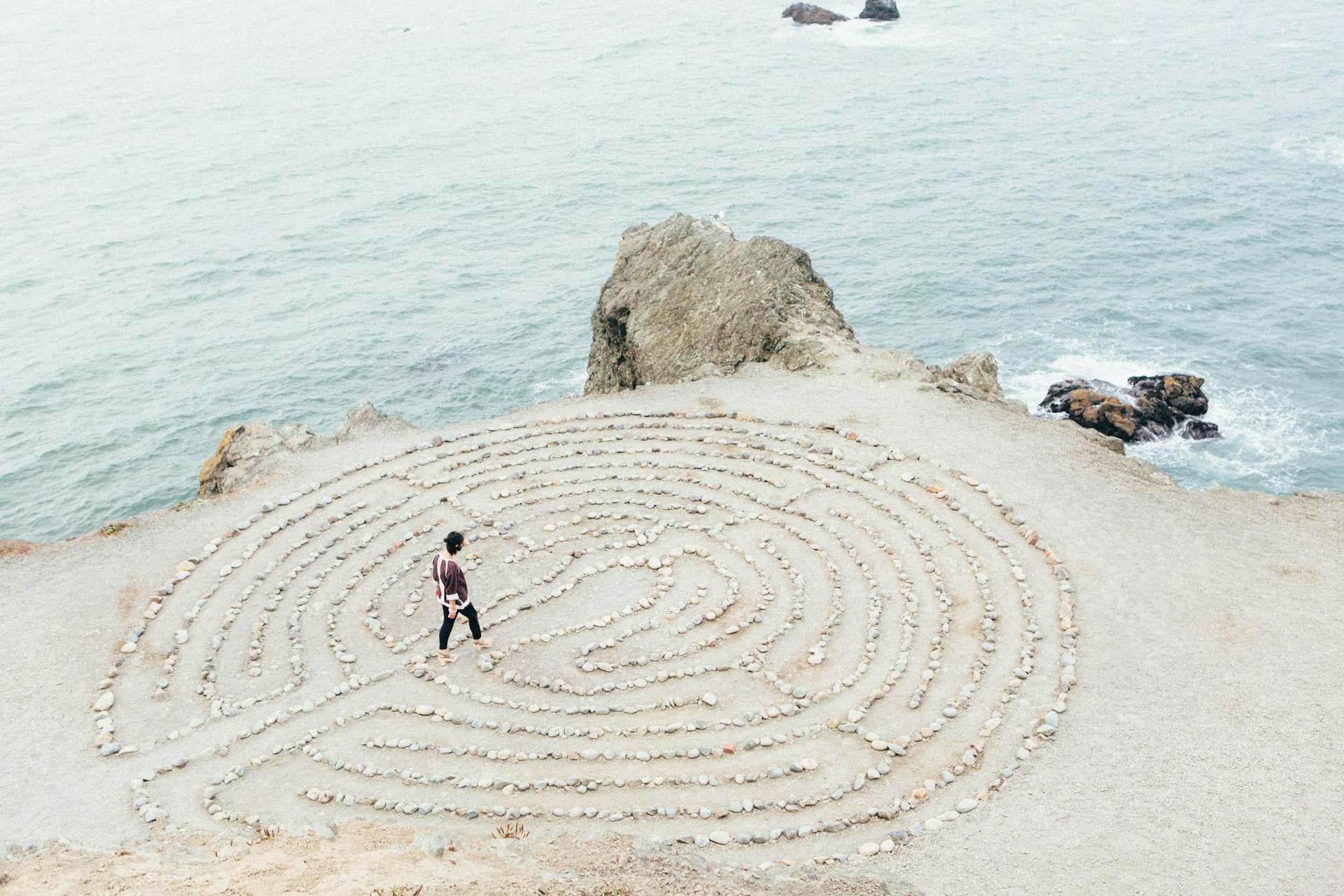 Spiral on stones near the sea, representing the subconscious mind