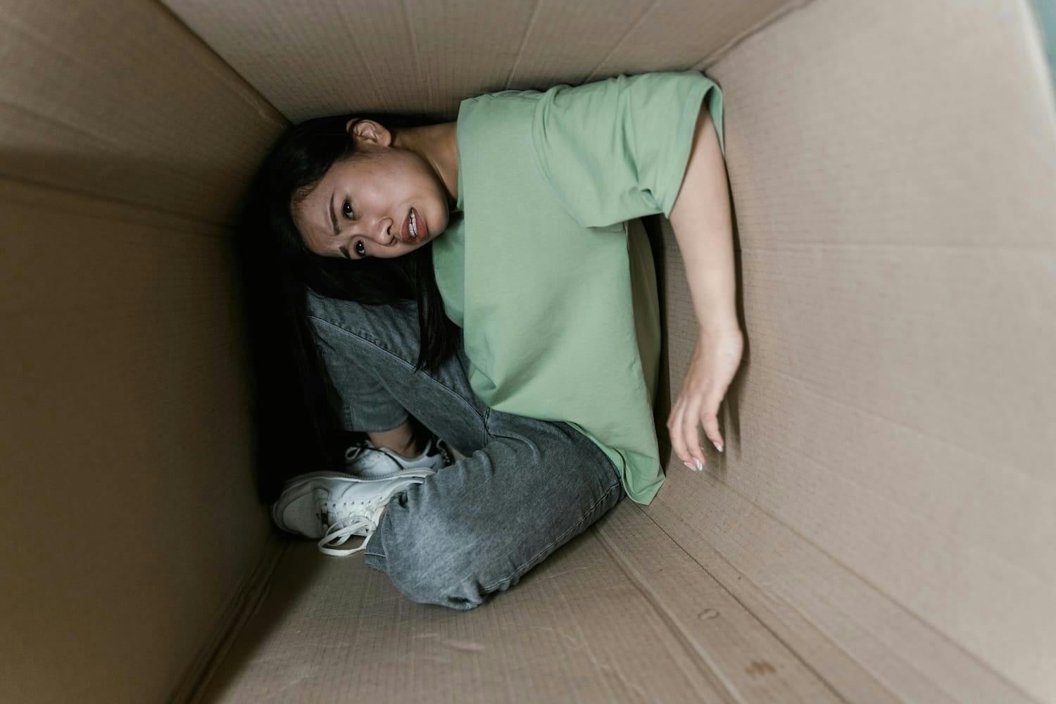Person trapped in cardboard