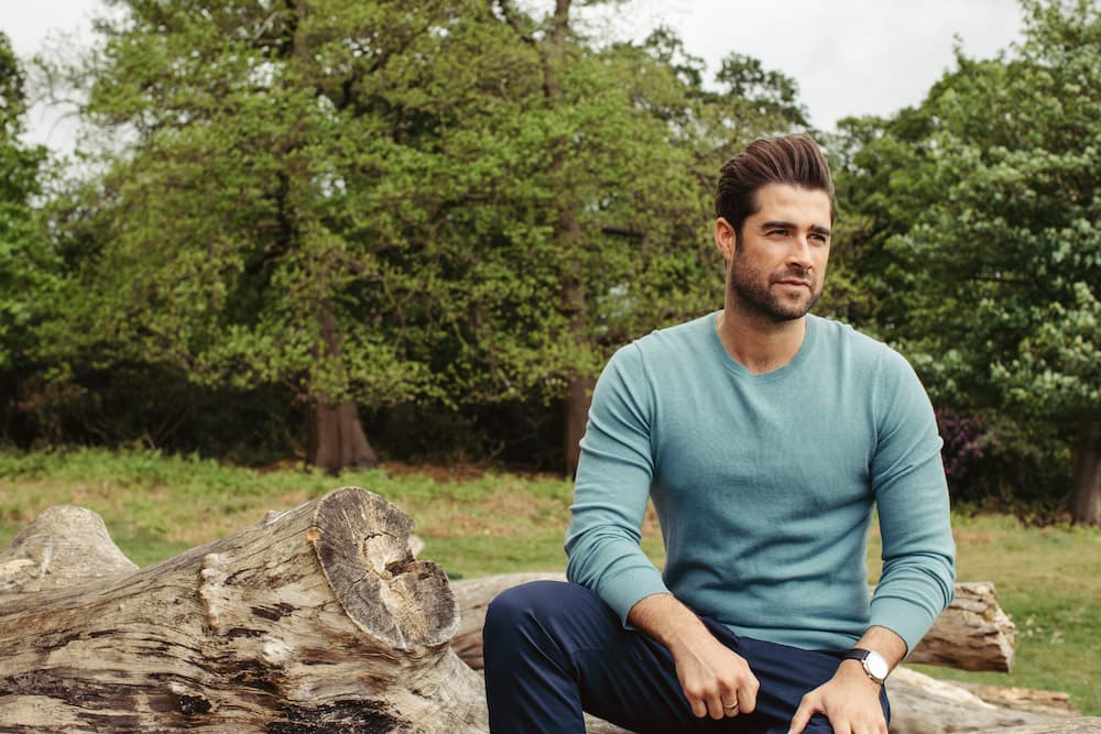 This is a photo of Matt sat on a log