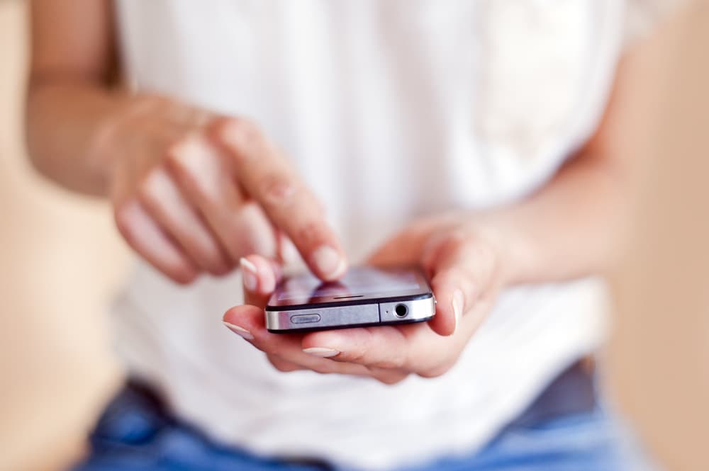 A woman using a mobile phone