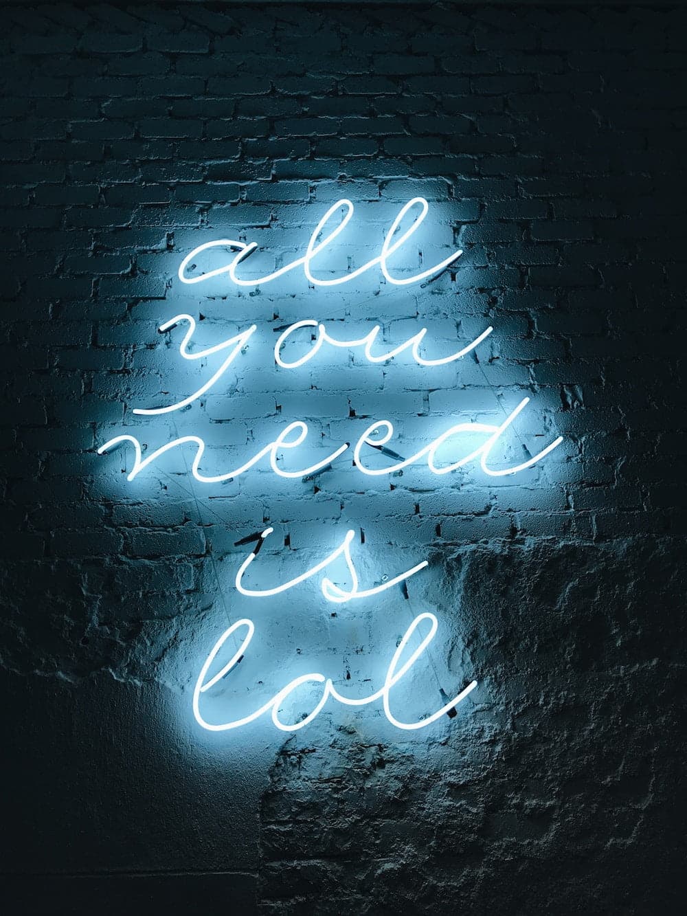 Sign saying all you need is lol