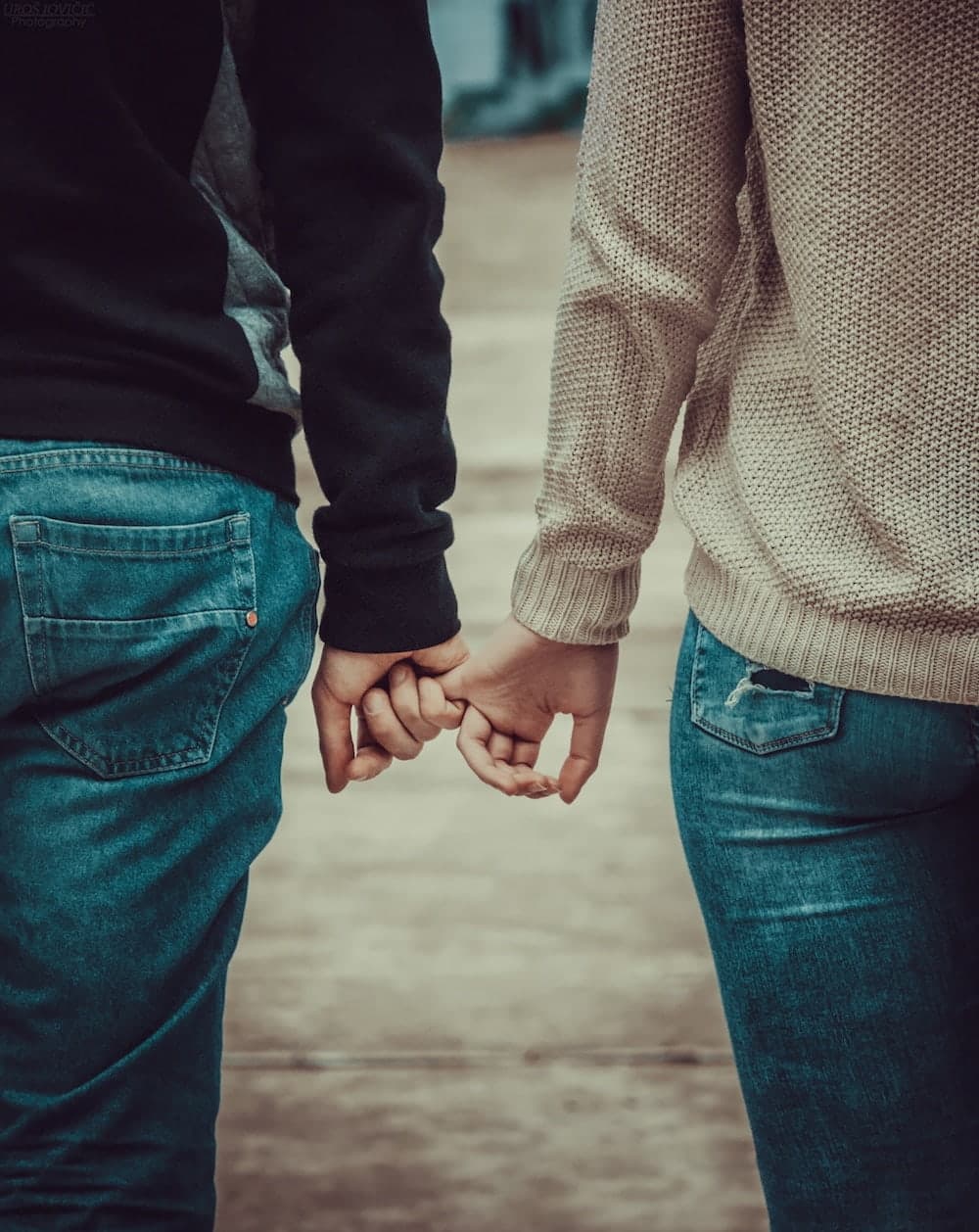 couple holding hands