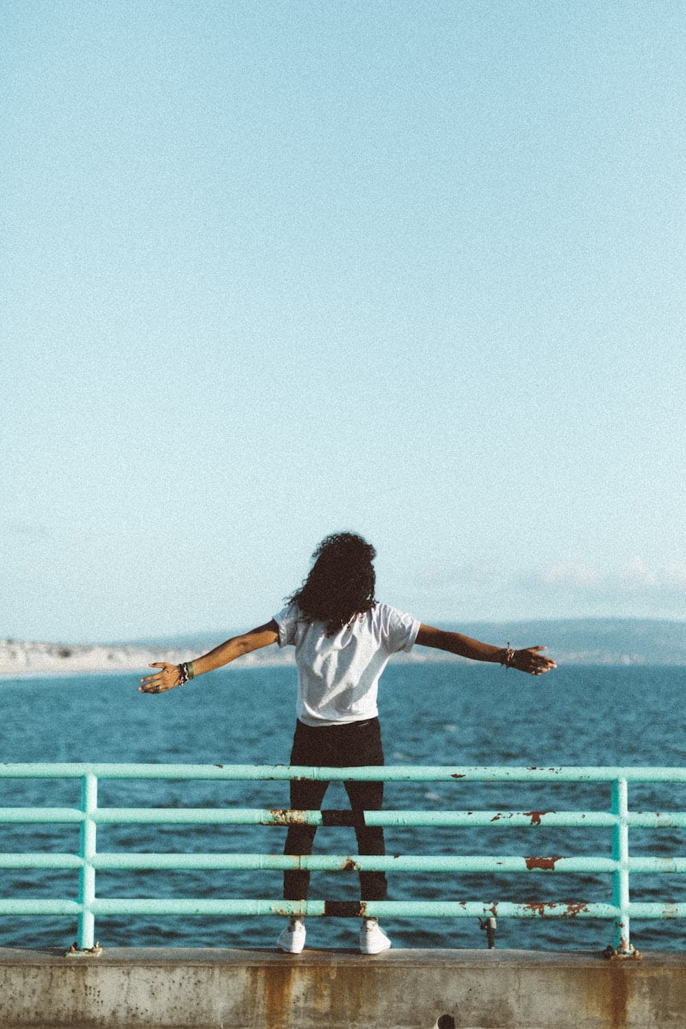 woman stretching her arms