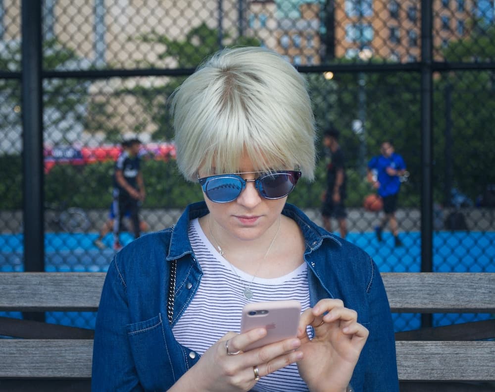 woman checking her phone