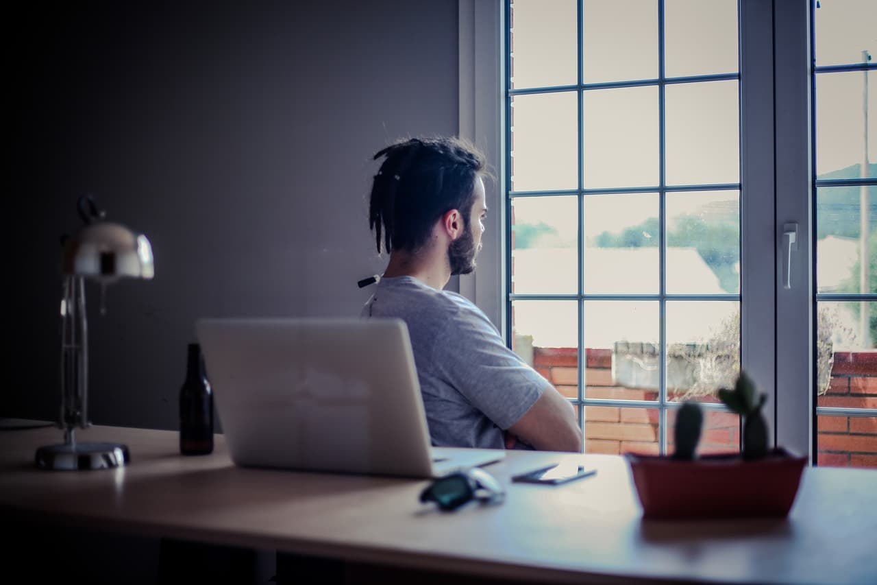 computer-engineer-looks-out-of-window