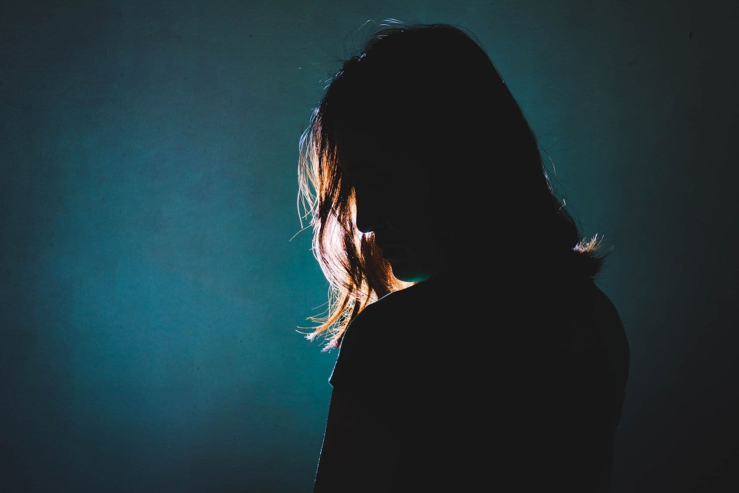How can businesses support employees through domestic abuse?