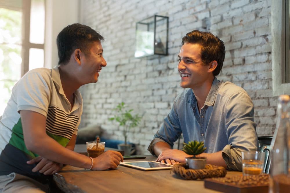 Two men talking