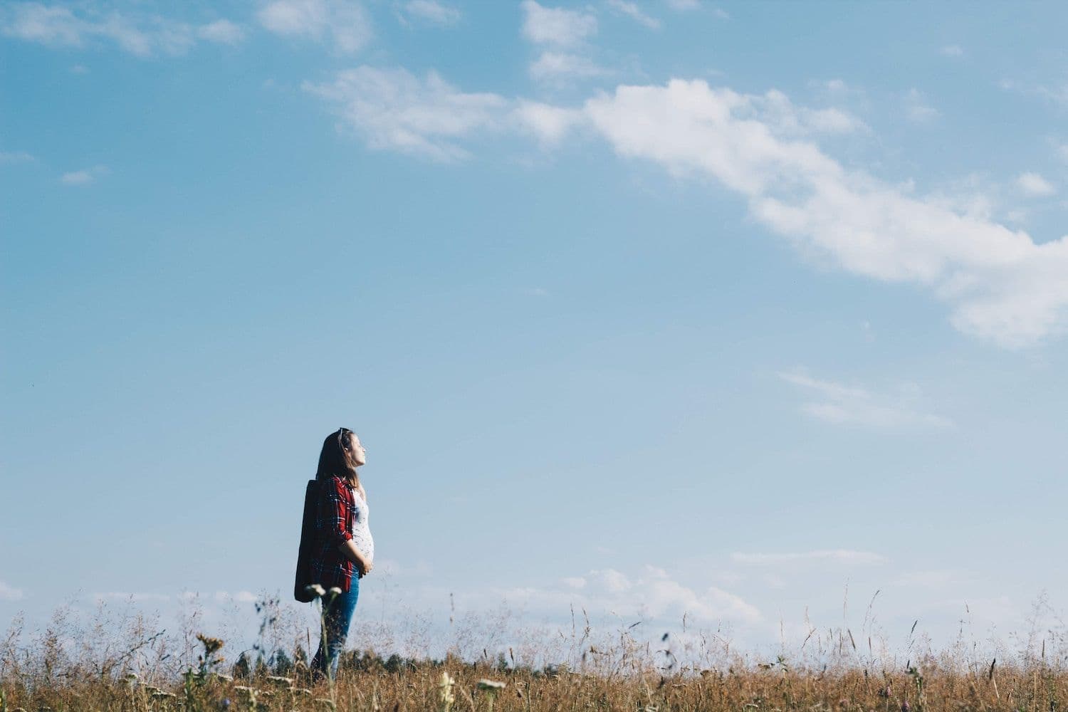 Woman looking up at sky