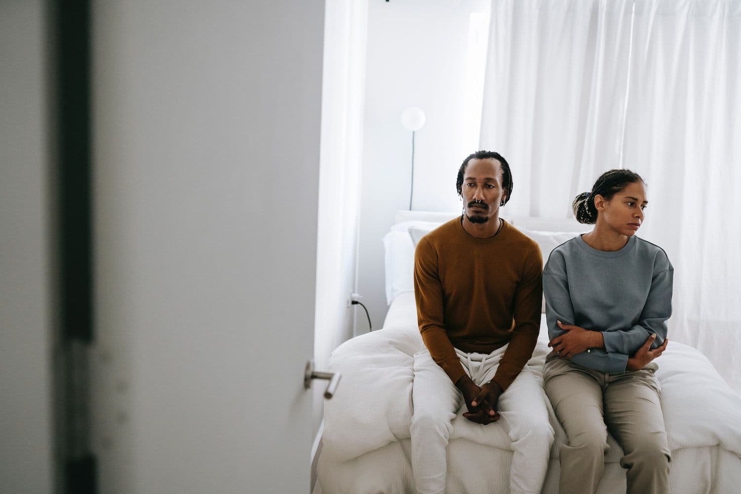 A couple facing away from each other