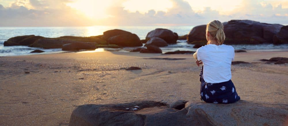 woman watching the sunrise
