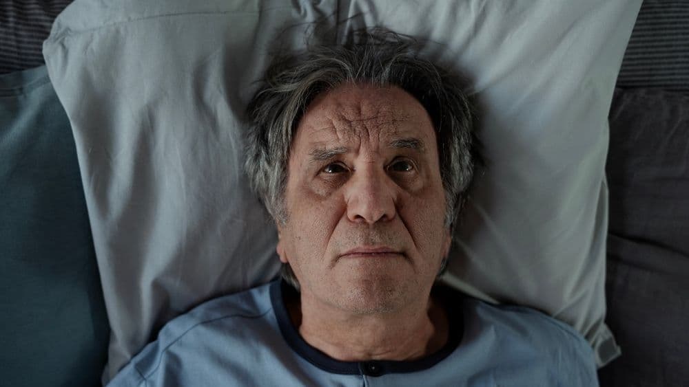 Man laying on a pillow
