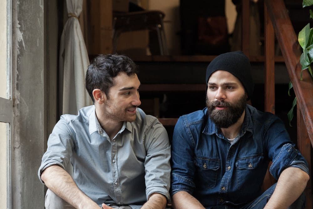 Two men talking